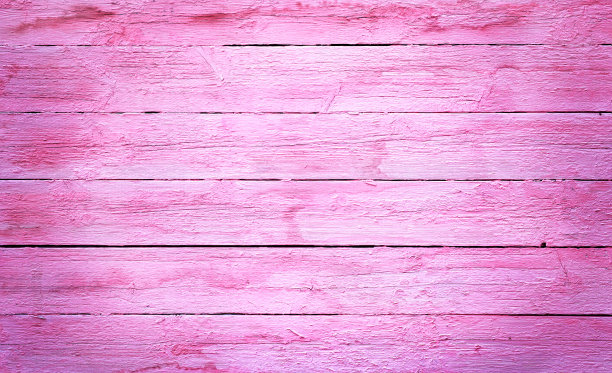 涂着粉红色油漆的旧木板被乡村的背景弄裂了图片下载