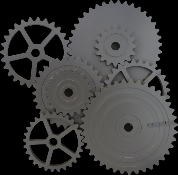 黑色背景上的钢齿轮图片下载
