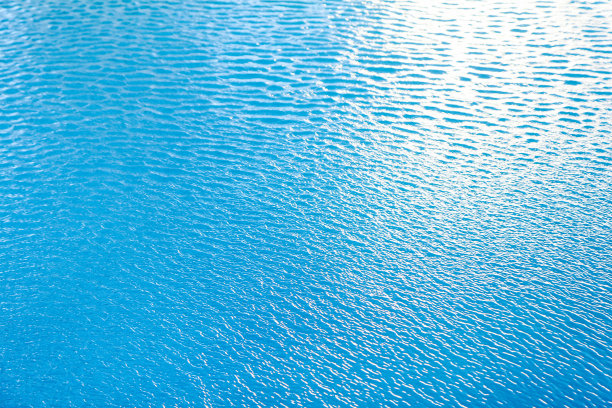 水波表面背景。浅绿色背景纹理。抽象水波选择焦点。设计元素的旗帜和艺术品图片下载