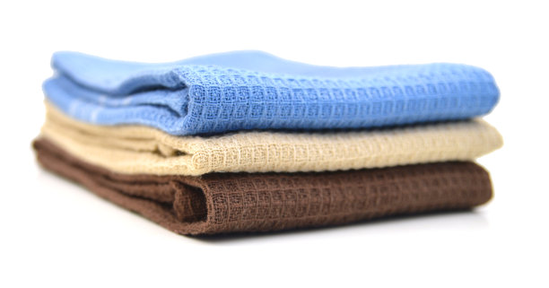 彩色棉布餐巾或台布孤立在白色/坏盖/枕套上图片下载