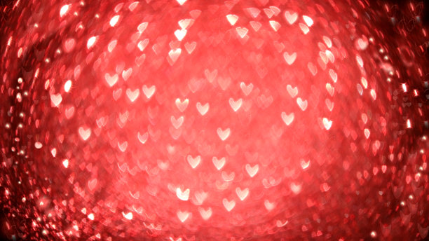 情人节或妇女节的贺卡。红心在抽象模糊的红色背景与散景。假日背景，覆盖模板在照片编辑器的设计，文本的地方，横幅为屏幕。图片下载