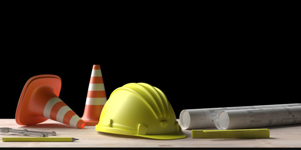 师工作。木桌上有项目施工蓝图和工程工具。三维演示图片下载