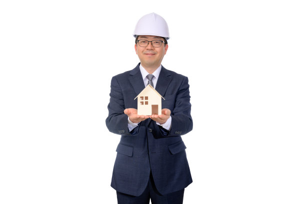 房地产经纪人拿着玩具房子图片下载