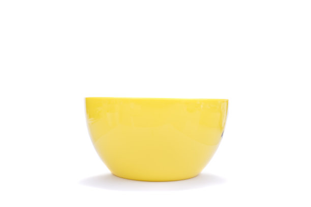 白色背景上的黄色空碗图片下载