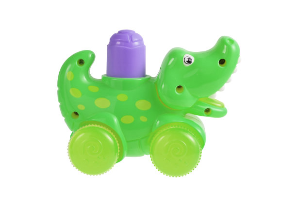 白色背景上孤立的塑料鳄鱼玩具，在浴缸里玩的玩具图片下载