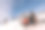 在冬天的森林里驾驶雪地摩托的漂亮女人。图片下载