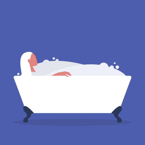 年轻的女性角色在充满肥皂泡沫的浴缸中洗澡，放松和身体治疗图片下载