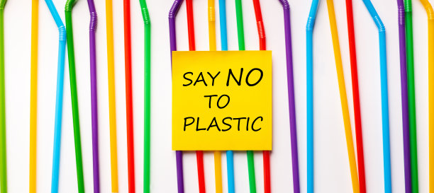 把“对塑料说不”写在纸上作为背景图片下载