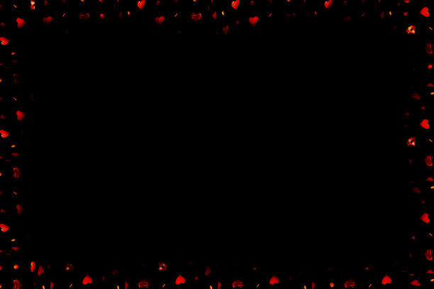 发光的红心在黑色背景周围形成一个边界。矩形形状。图片下载