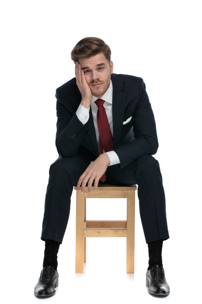 年轻优雅的商人手心对着脸图片下载