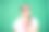 年轻女子斗鸡眼做一个沉默的手势在休闲服装对绿色背景-库存照片图片下载