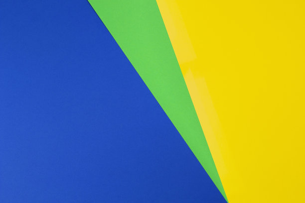 抽象彩色纸纹理背景。最小的几何形状和线蓝色，绿色，黄色图片下载