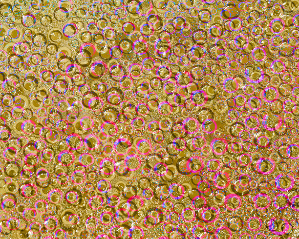 随机交织的不同直径的环和棕色，粉红色和米黄色的图案在橄榄色的背景。抽象的幻想。图片下载