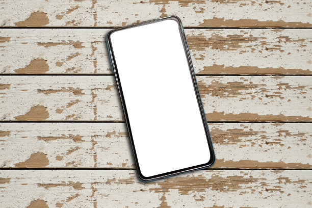 木桌上的手机图片下载