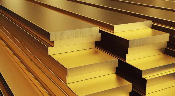 黄铜棒堆栈。金属制品滚。图片下载