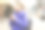 时尚美女的肖像穿着紫色的夹克在街上。概念照片与一杯热饮图片下载