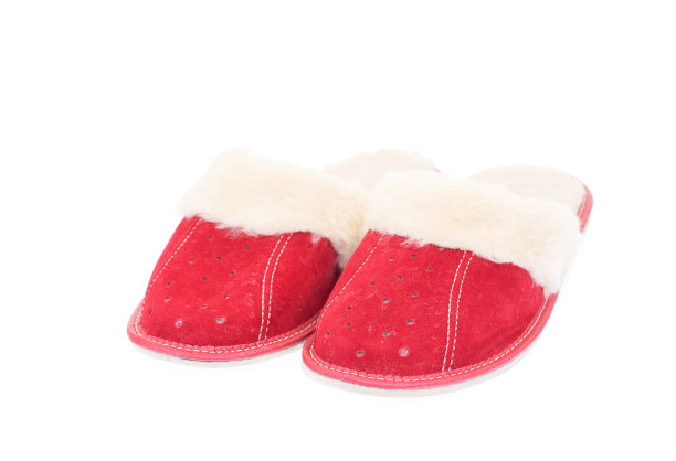 红女人的拖鞋被孤立在白色的背景上。图片下载