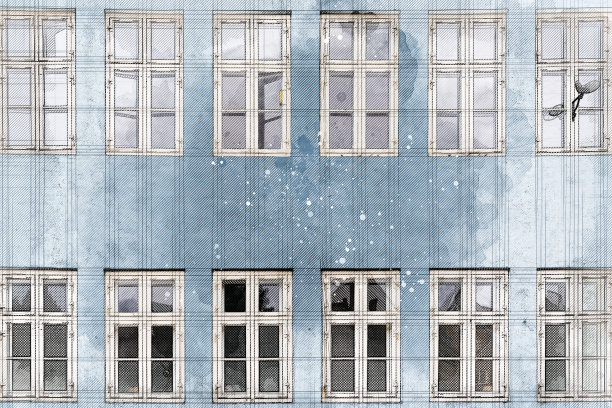 建筑师在旧建筑上画了白色的窗户图片下载