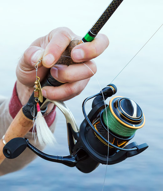 带鱼饵的钓竿和卷轴图片下载