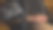 一个男人一边看电影，一边偷偷地拍电影。图片下载