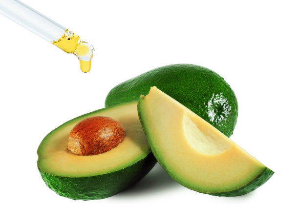 鳄梨组和吸管滴管与油图片下载