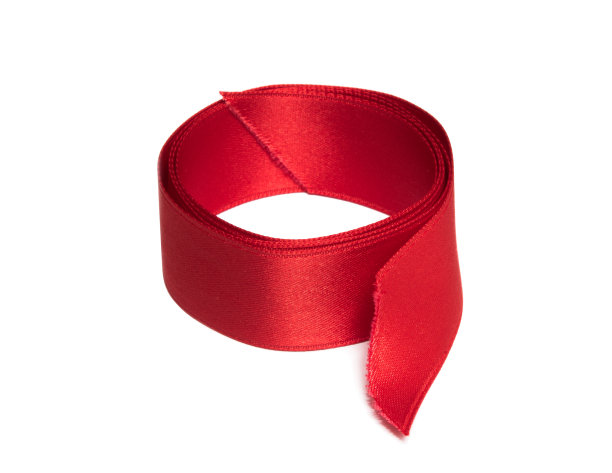 红色的丝带在白色的背景上滚动图片下载