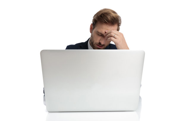 疲惫的商人手捧额头图片下载