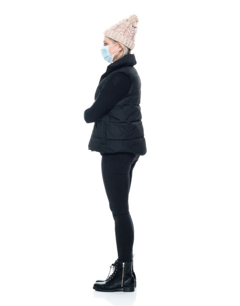 白人女性无袖穿着靴子蹲图片下载