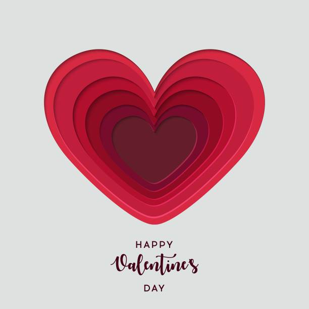 剪纸的心。模板为情人节和贺卡的背景。素材图片