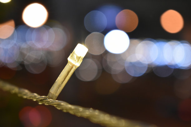 抽象的金色散景光背景。图片下载