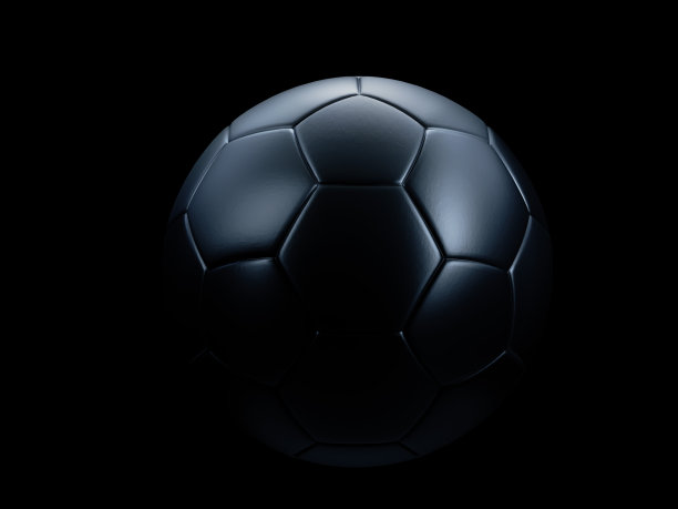 黑色背景下的黑色足球。图片下载