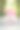 女孩带着粉色的球坐在草地上。生日- 1岁图片下载