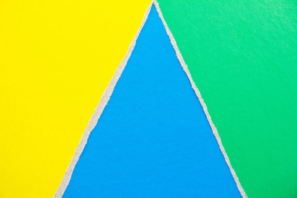 蓝色、绿色和黄色撕破的纸片和纸板纹理背景。文本信息的复制空间。图片下载