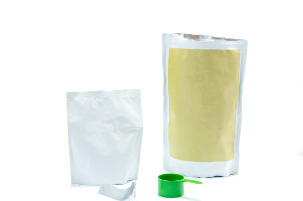 食品包装及量匙。包装中的食物。图片下载