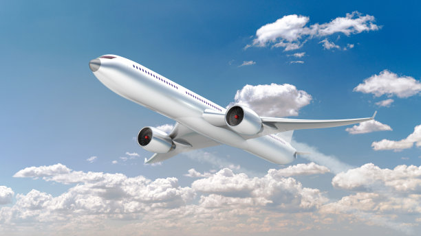 飞机在蓝天白云中飞行。图片下载