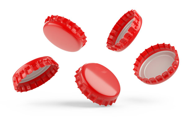 红色的啤酒瓶上落下红色的瓶盖，雨从盖子上落下。模板的设计。图片下载