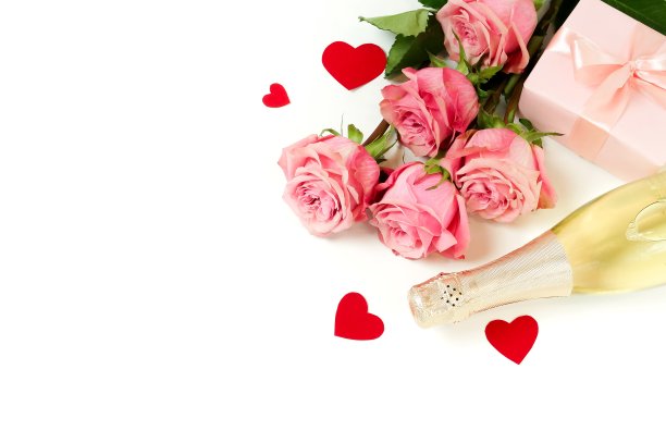 情人节，生日背景。粉红色玫瑰花束，礼盒，香槟瓶和红心纸屑孤立在白色背景与复制空间。俯视图平铺图片下载