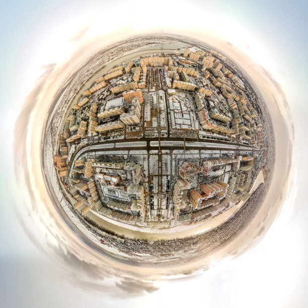 冬季全景城市景观小星球无人机视图-宽阔的积雪的大道被高层公寓大楼包围着库班河在一个阳光明媚的清晨图片下载