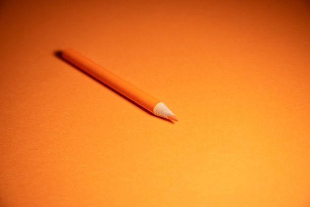 橙色的铅笔和背景图片下载