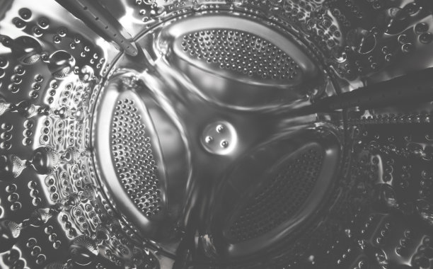 金属滚筒洗衣机的特写。广角照片图片下载