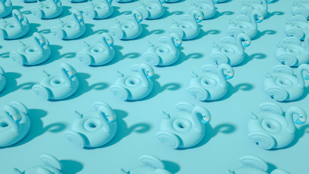 充气火烈鸟的蓝色背景，最小的夏季和旅游概念图片下载