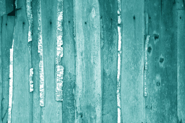 墙壁由未切割的风化木板制成，色调为青色。图片下载