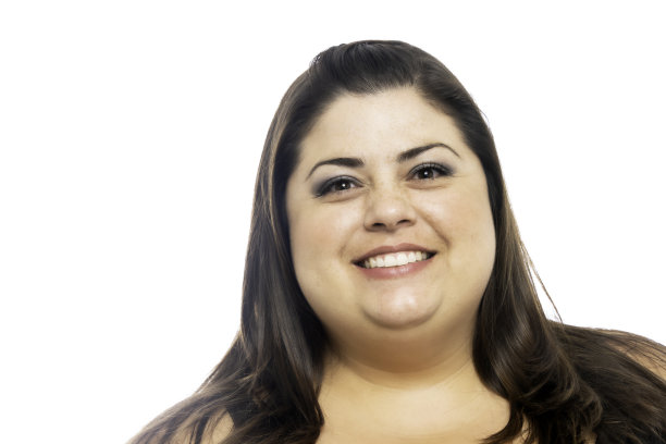 中年妇女在白色背景下看着相机图片下载