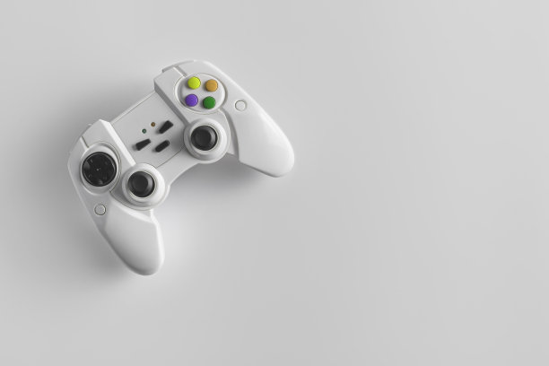 白色无线游戏手柄玩电子游戏。白色背景上的操纵杆或游戏控制器。图片下载