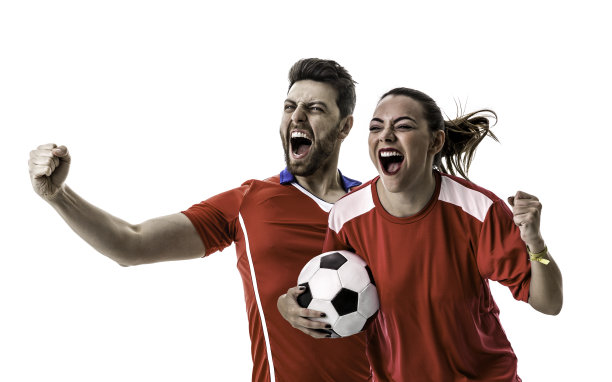 年轻的一对球迷穿着红色制服庆祝图片下载