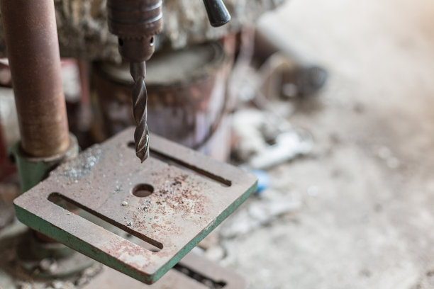 近景钻压背景模糊图片下载