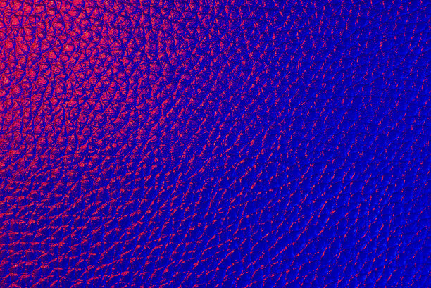 粉色和蓝色霓虹生态人造皮革纹理近距离。前视图。副本的空间。图片下载