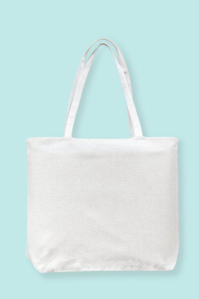 大手提袋帆布白色棉布生态肩购物袋原型空白模板孤立在淡蓝色背景(剪切路径)图片下载