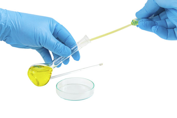 戴手套的手从试管中取样图片下载
