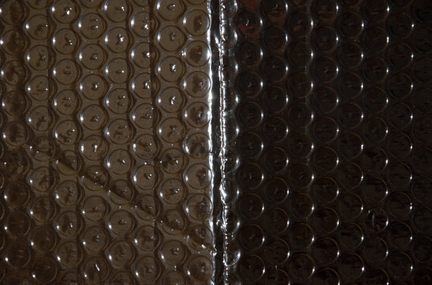 背景反射银色表面与圆形图案纹理图片下载